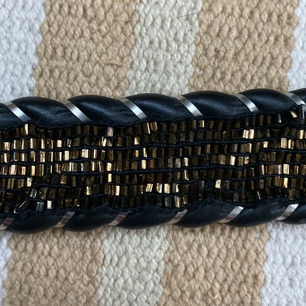 BB Simon belt with beads. Silver distressed hardware and beads. Good condition.